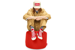 Girl Sitting on a Red Fatboy Point Outdoor Ottoman with White Stitching