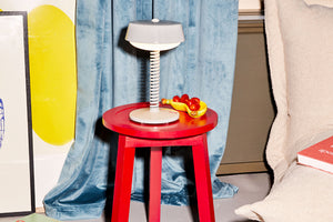 Desert Fatboy Bellboy Lamp on a Red Table