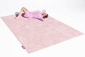 Girl Laying on a Baby Bum Fatboy Bubble Carpet