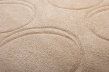 Load image into Gallery viewer, Closeup of a Creamy Camel Fatboy Dot Carpet
