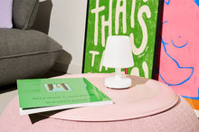 Load image into Gallery viewer, Fatboy Edison Mini Sitting on a Pink Table
