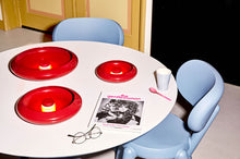 Load image into Gallery viewer, Fatboy Oloha Trio - Lobby Red - Sitting on a Dining Table
