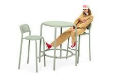 Load image into Gallery viewer, Girl Sitting on a Mist Green Fatboy Toni Barfly Bar Stool at a Haute Bisteau Table
