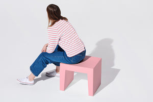 Girl Sitting on a Candy Fatboy Concrete Seat