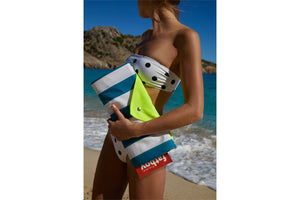 Girl Carrying a Folded Azur Fatboy Miasun Sun Shade 