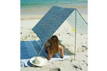 Load image into Gallery viewer, Woman Laying Under a Bali Fatboy Miasun Sun Shade on the Beach
