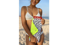 Load image into Gallery viewer, Girl Holding a Folded Capri Fatboy Miasun Sun Shade on the Beach
