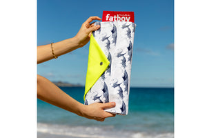 Woman Holding a Folded Fuji Fatboy Miasun Sun Shade
