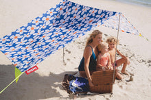 Load image into Gallery viewer, Mom and Children Sitting Under a Malibu Fatboy Miasun Sun Shade on the Beach

