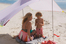 Load image into Gallery viewer, Lady and Child Sitting Under a Melrose Fatboy Miasun Sun Shade on the Beach
