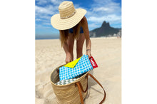 Load image into Gallery viewer, Girl Taking a Folded Venice Fatboy Miasun Sun Shade Out of Her Beach Bag
