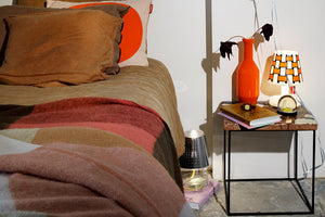 Basket Weave Pumpkin Orange Fatboy Cooper Cappie on Night Stand Next to Bed
