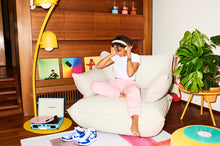 Load image into Gallery viewer, Model Sitting in a Limestone Fatboy Sumo Loveseat
