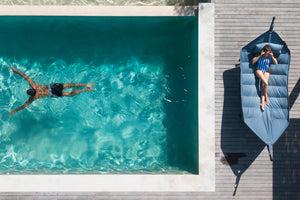 Model Laying in a Fatboy Headdemock Superb Hammock by the Pool