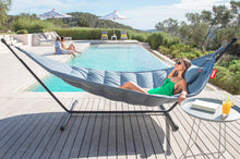 Load image into Gallery viewer, Girl Laying in a Storm Blue Fatboy Headdemock Superb Hammock by the Pool
