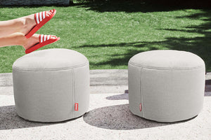 Two Mist Fatboy Point Outdoor Ottomans on a Patio