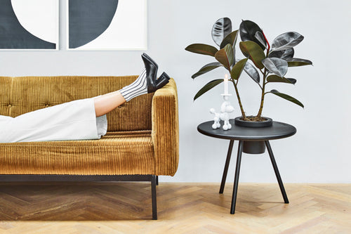 Anthracite Fatboy Bakkes Side Table Next to a Sofa