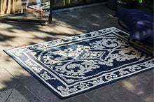 Load image into Gallery viewer, Royal Blue Fatboy Carpretty Petit Indoor / Outdoor Area Rug on Patio
