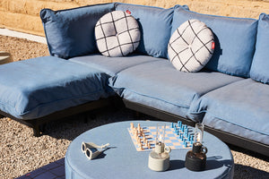 Moonrise Fatboy Circle Outdoor Pillows on a Paletti Lounge