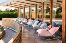 Load image into Gallery viewer, Fatboy Original Outdoor Bean Bags on Rock &#39;n Roll Rocker Bases on a Patio
