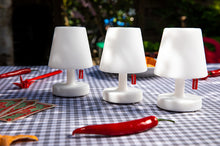 Load image into Gallery viewer, Fatboy Edison the Mini Lamps on a Table with Red Peppers
