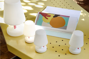 Fatboy Edison the Mini Lamps on Table Next to Edison the Petit