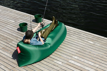 Load image into Gallery viewer, Girl Laying in a Jungle Green Fatboy Lamzac Lounger
