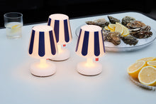 Load image into Gallery viewer, Fatboy Edison the Mini Lamps with Mini Cappies on a Table
