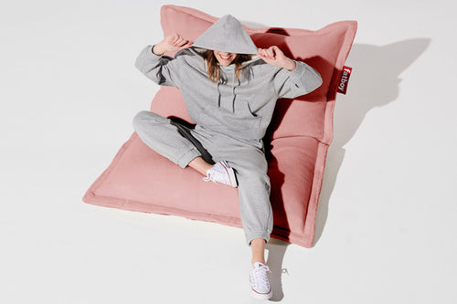 Girl Sitting on a Cheeky Pink Fatboy Slim Teddy Bean Bag Chair