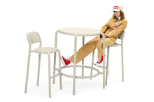Load image into Gallery viewer, Model Sitting at a Desert Fatboy Toni Haute Bistreau
