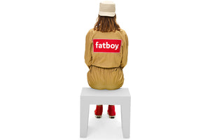 Girl Sitting on a Light Grey Fatboy Concrete Seat
