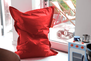 Red Fatboy Junior Bean Bag Chair in a Kid's Room