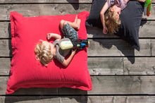 Load image into Gallery viewer, Boy Laying on a Red Fatboy Junior Stonewashed Bean Bag Chair

