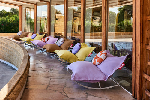 Fatboy Original Stonewashed Bean Bag Chairs on Rock 'n Roll Rocker Bases on a Patio