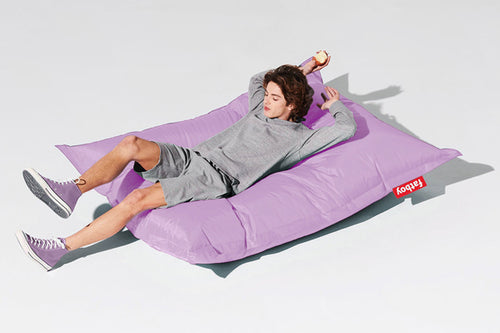 Guy Laying on a Lilac Fatboy Original Slim Nylon Bean Bag