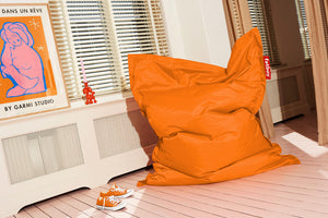 Orange Bitters Fatboy Original Slim Bean Bag Chair in a Room