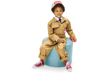Load image into Gallery viewer, Boy Sitting on an Ice Blue Fatboy Point Ottoman
