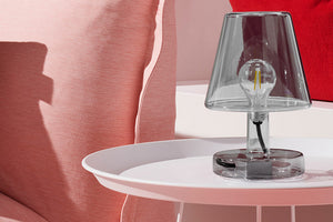 Grey Fatboy Transloetje Table Lamp on a Table